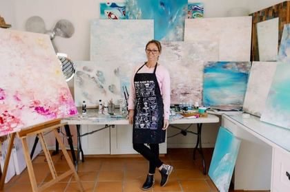 Ritushka painting in her Lane Cove studio
